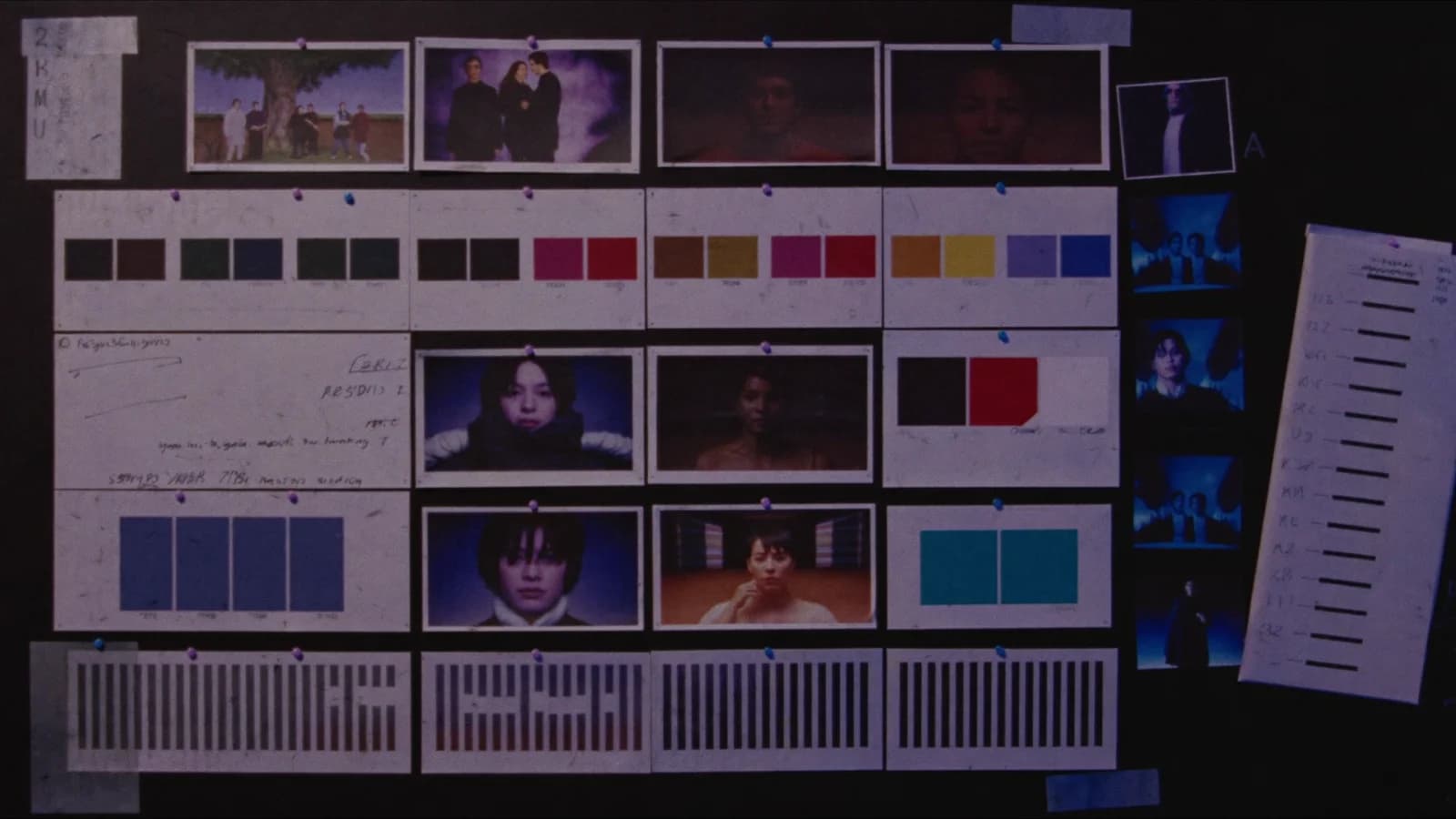 An overhead mood board with pinned reference photos, color swatches, and a printed audio waveform strip, cinematic still