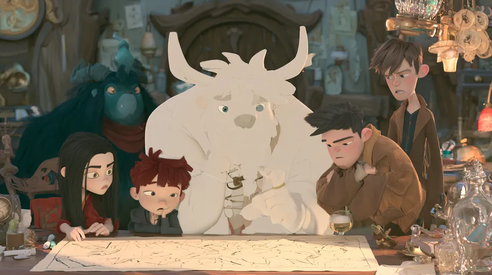Four children and a large white horned creature lean over a hand-drawn map on a cluttered table