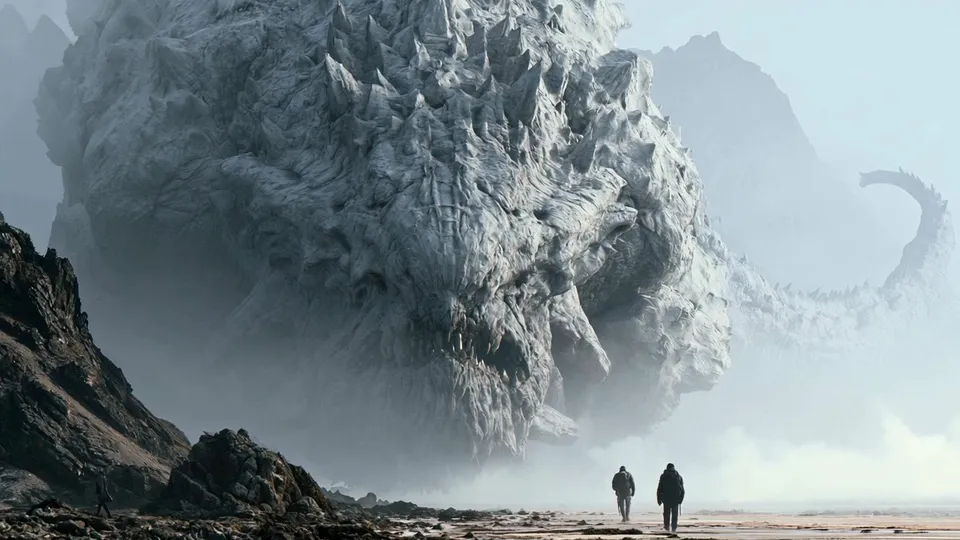 Two people walking on a misty beach toward a pale spiked giant creature